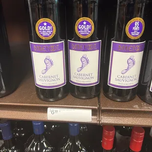 bottles of wine on a shelf