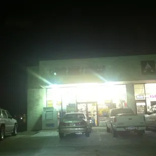 cars in parking lot at night