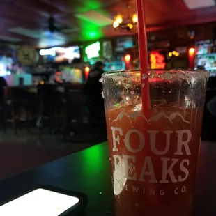 a drink in a glass with a straw