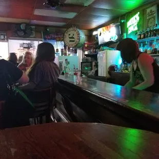 people sitting at the bar