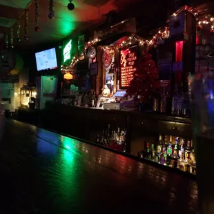 a bar with a television in the background