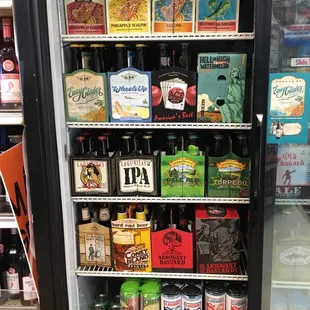 a refrigerator full of beer bottles
