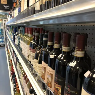 shelves of wine in a grocery store