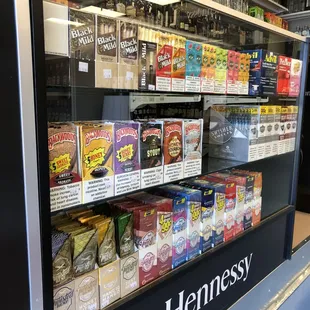 shelves of liquor and beer in a store