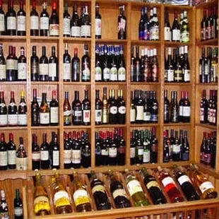 a wall full of wine bottles
