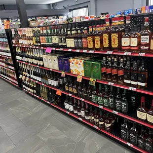 shelves of liquor in a grocery store