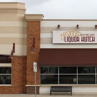 the front of a liquor hutch