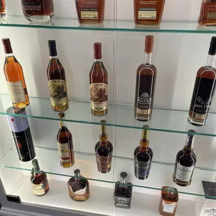a display of various bottles of alcohol