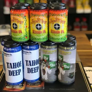 a variety of cans of beer