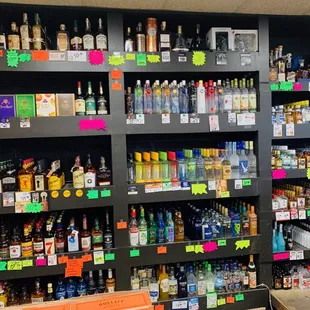 a wide selection of liquor bottles