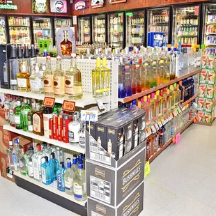 a variety of liquor bottles in a liquor store