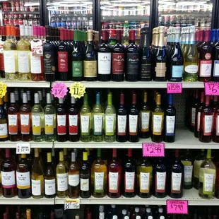 a variety of wines on shelves