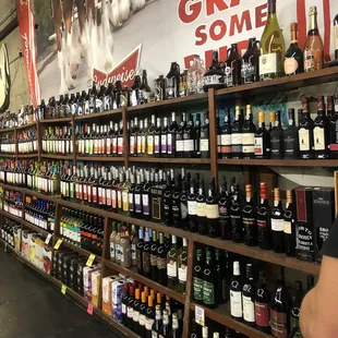 shelves of wine in a store
