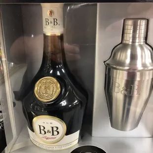 a bottle of booze and a cocktail shaker