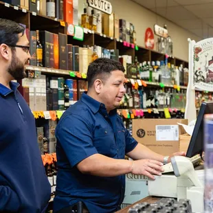 two men in a liquor store