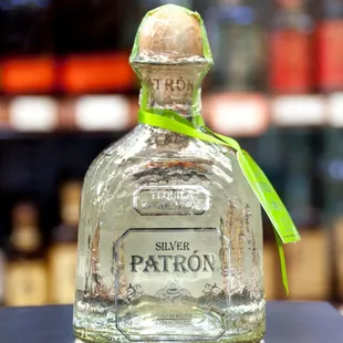 a bottle of patron silver tequila
