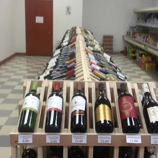 rows of bottles of wine on display