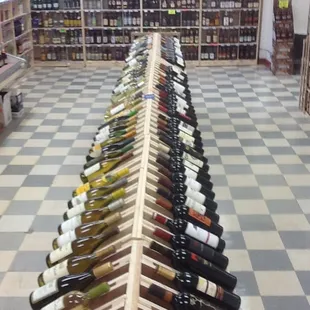 rows of bottles of wine on display