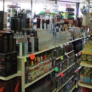 a variety of liquor bottles on shelves