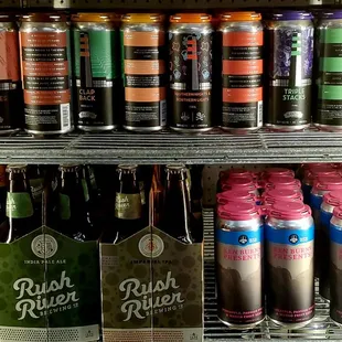 a variety of beers in a cooler