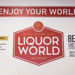 a sign for the liquor world