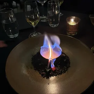 Death by chocolate: impressive flambe presentation with rich chocolate and coffee flavors in the round puck. 4.5 stars