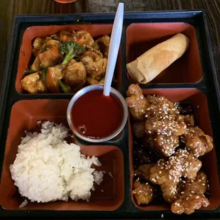 Bento box lunch- sesame chicken, shrimp stir-fry, egg roll and white rice-$9.99. Chicken was tasty and flavorful- NOT all breading.
