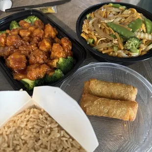 Orange chicken, veg lo mein, egg rolls and fried rice