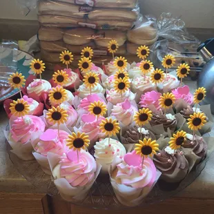 My sister added the sunflowers (it was the theme). Lisa + her team did all other decorations.