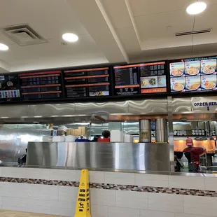 a restaurant counter with menus