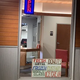 Front window and handmade sign