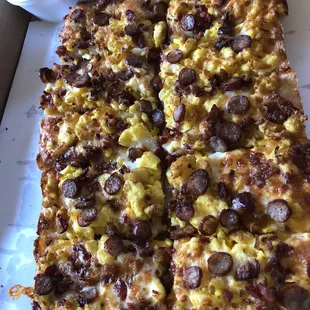 Breakfast pizza with sausage gravy on the side