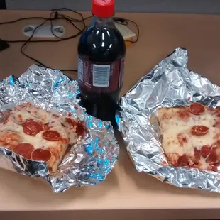 Two square slices + pop $5 out the door