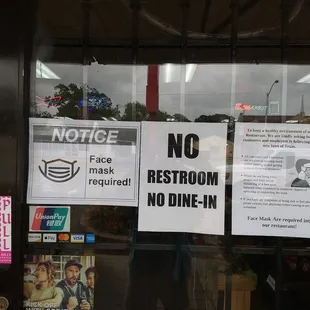 a sign in the window of a restaurant