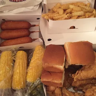 Jalapeño corn dog, crinkle cut fries, fried chicken, and buttery corn on the cob