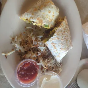 Breakfast burritos, harsh brown, salsas and sour cream.