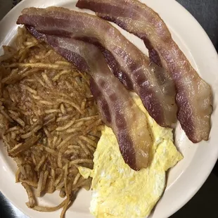 Eggs bacon to order and hash browns