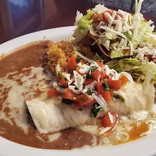 Chicken Enchilada and Taco combination plate