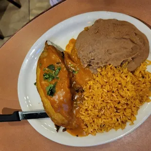 Chile Relleno with rice and refried beans