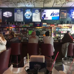 Bar. TV. Menu. Part of our table...