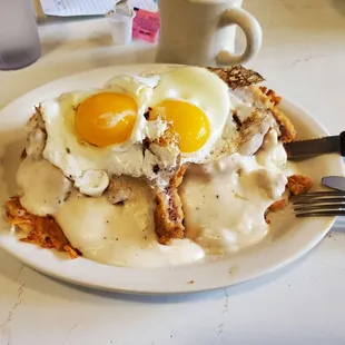 The Titanic - hasbrown bed, chicken fried steak, eggs, sausage and gravy