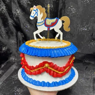 Custom specialty cake for the carnival event by Lisa Rum Cakes and staff! Beautiful