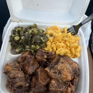 a meal in a styrofoam container