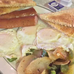 Sausage from Chicago, eggs, fried potatoes with peppers &amp; onions. Cooked right and cheap.  #UpCloseSavor
