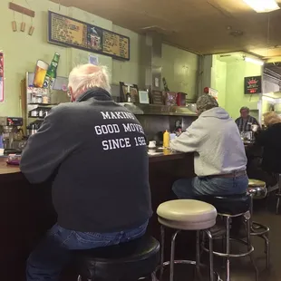 Early morning regulars grabbing some breakfast food.