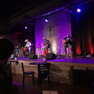 a group of musicians on stage