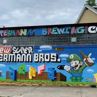 a mural of mario and luigi