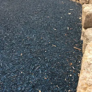 Playground wood chips are dyed blue... I guess for the theme of a ship for the playground