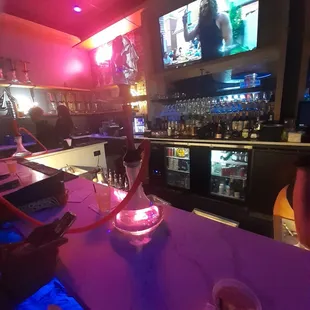 people sitting at the bar