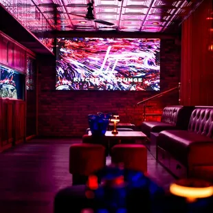 a bar with red lighting